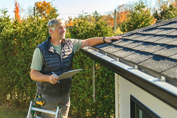Professional Roof Replacement technician working in Bellville, TX